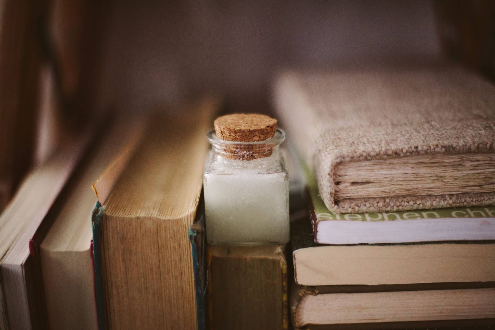 Glass Container On Books Pinterest Laptop Background