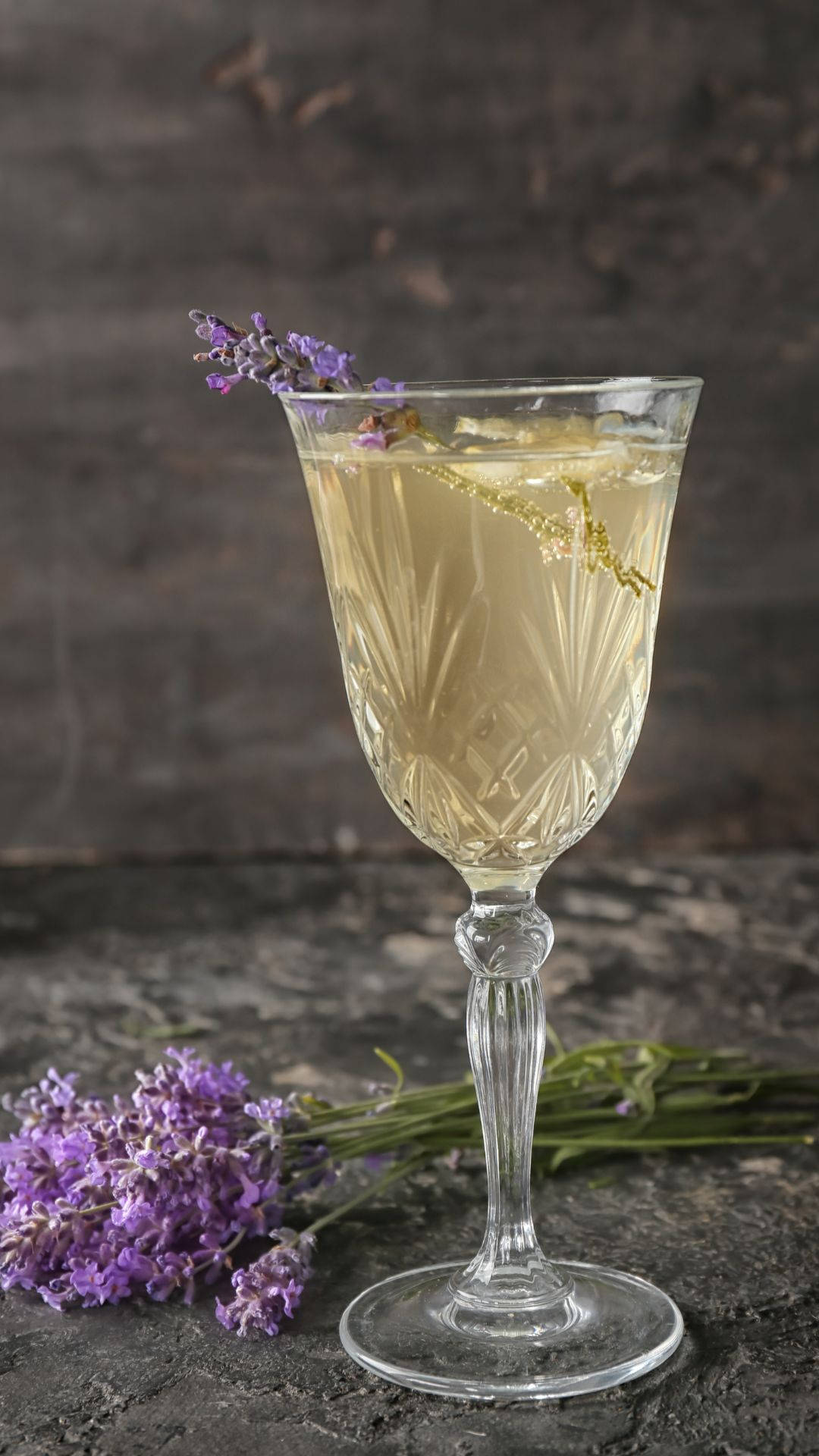 Glass Of Alcohol With Lavender Background