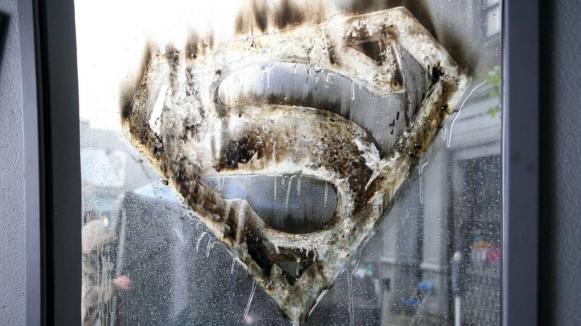 Glass Window With Superman Logo Background