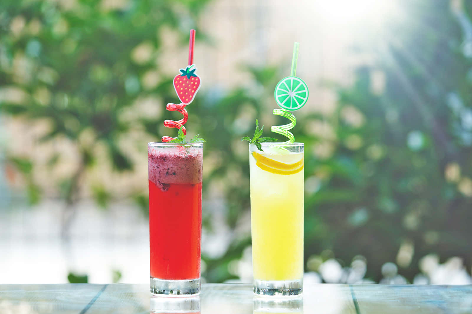 Glasses Of Strawberry And Lime Drinks Background