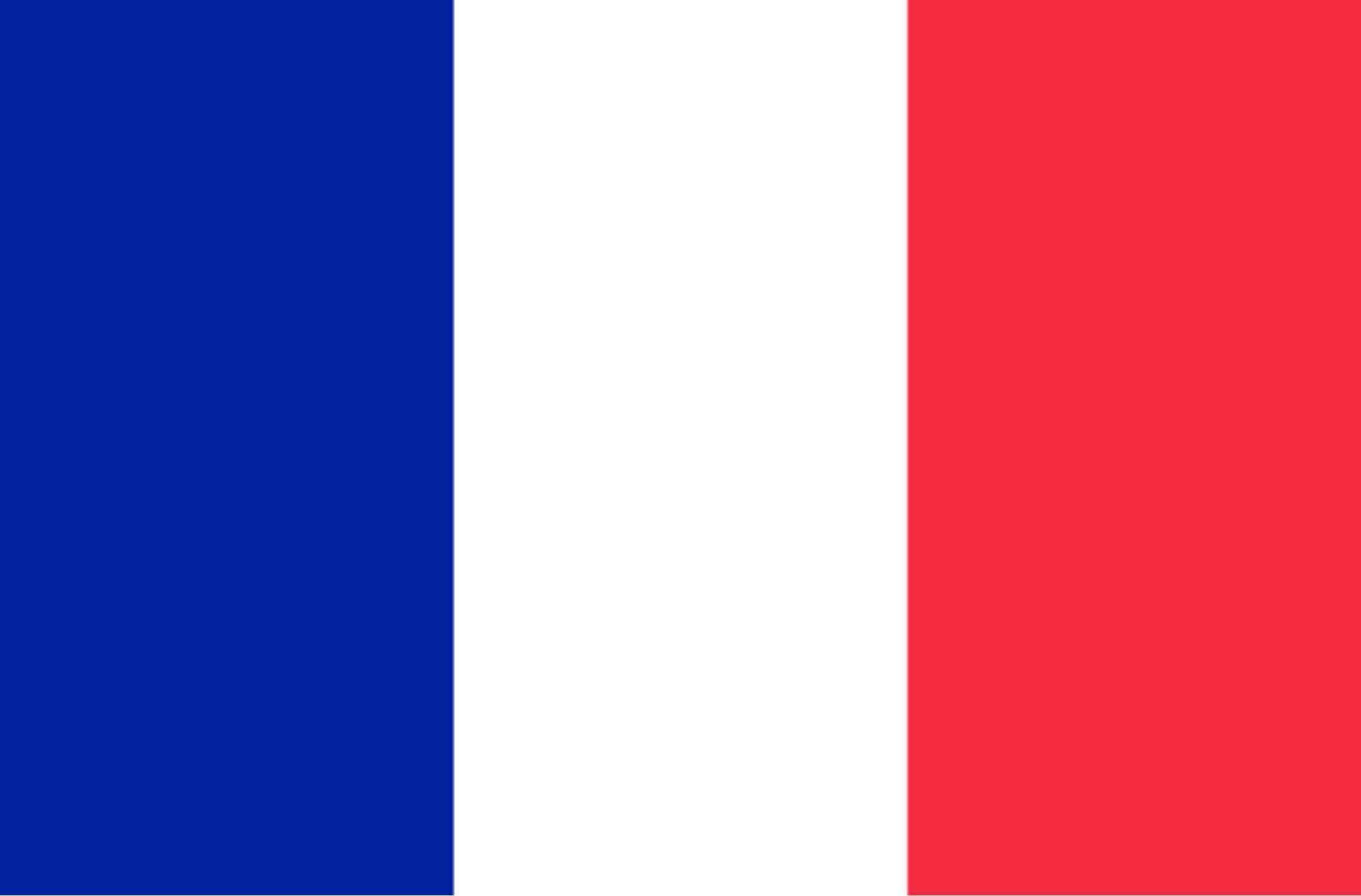 Gleaming French Flag Under Spotlight Background