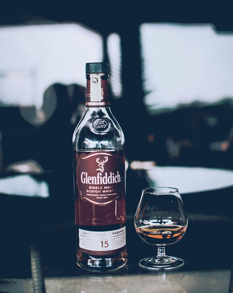 Glenfiddich 15 Year Old With Brandy Glass Background