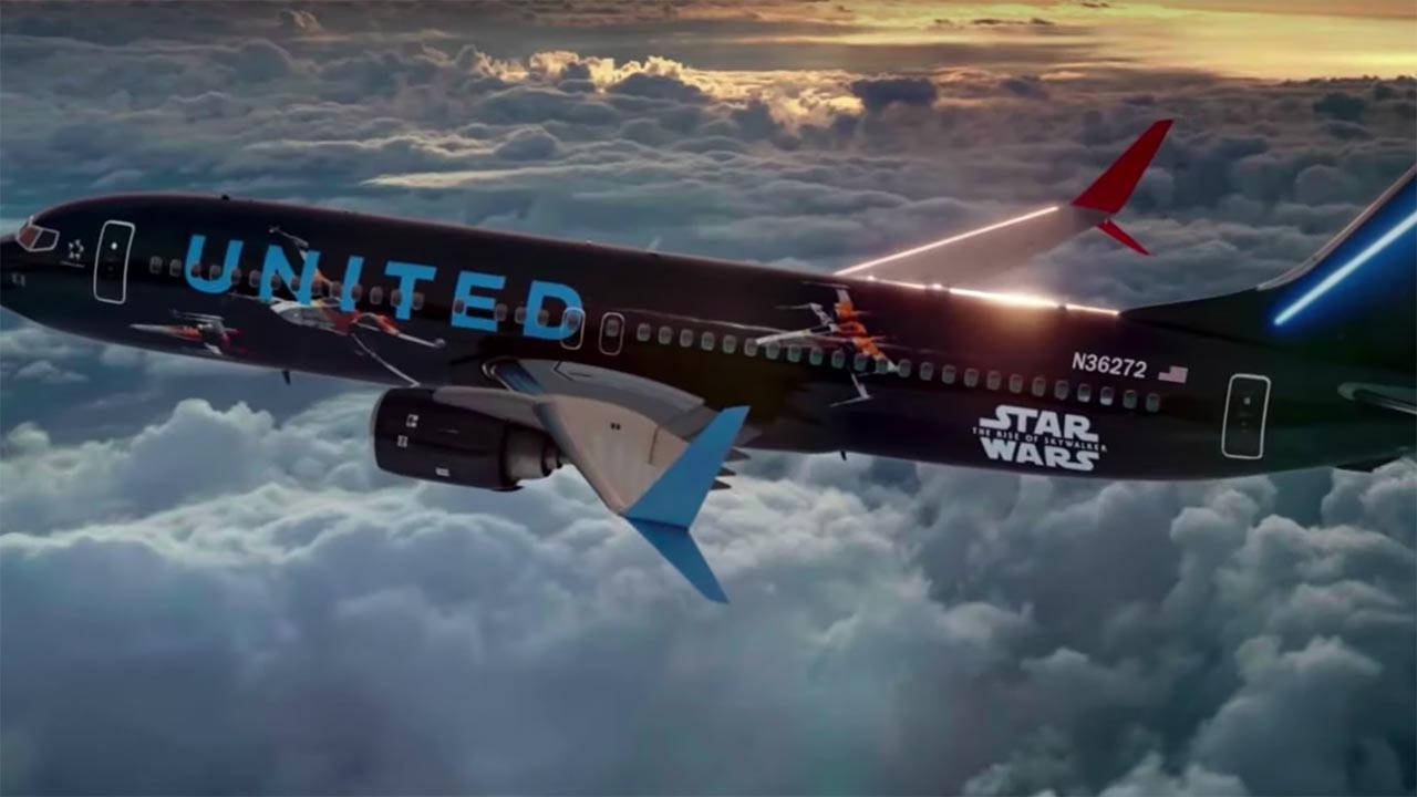 Gliding Black United Airlines Plane