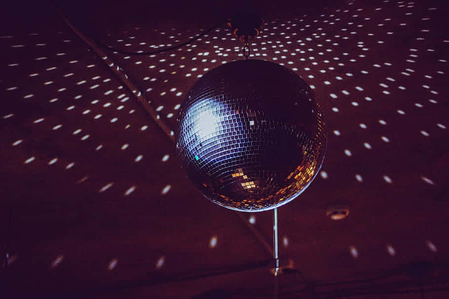 Glimmering Disco Ball Nightlife Background