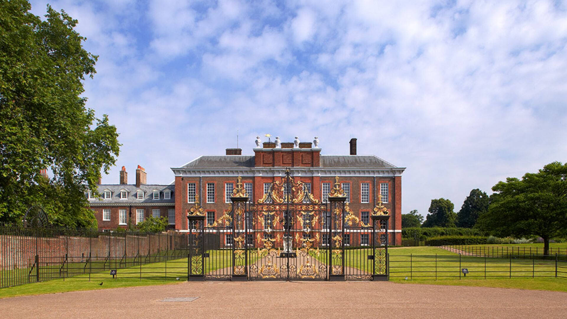 Glimpse Of Magnificent Kensington Palace From The Outside Gates Background