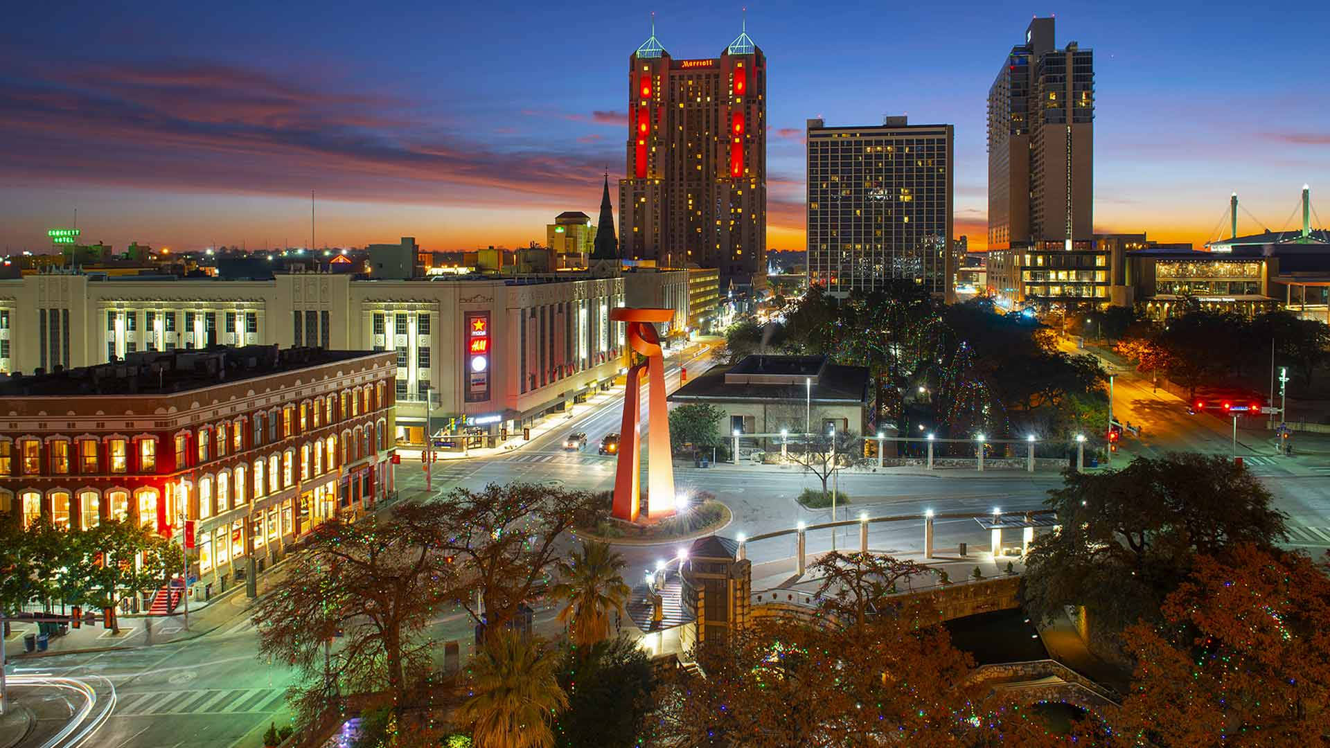 Glittering Downtown San Antonio At Night Background