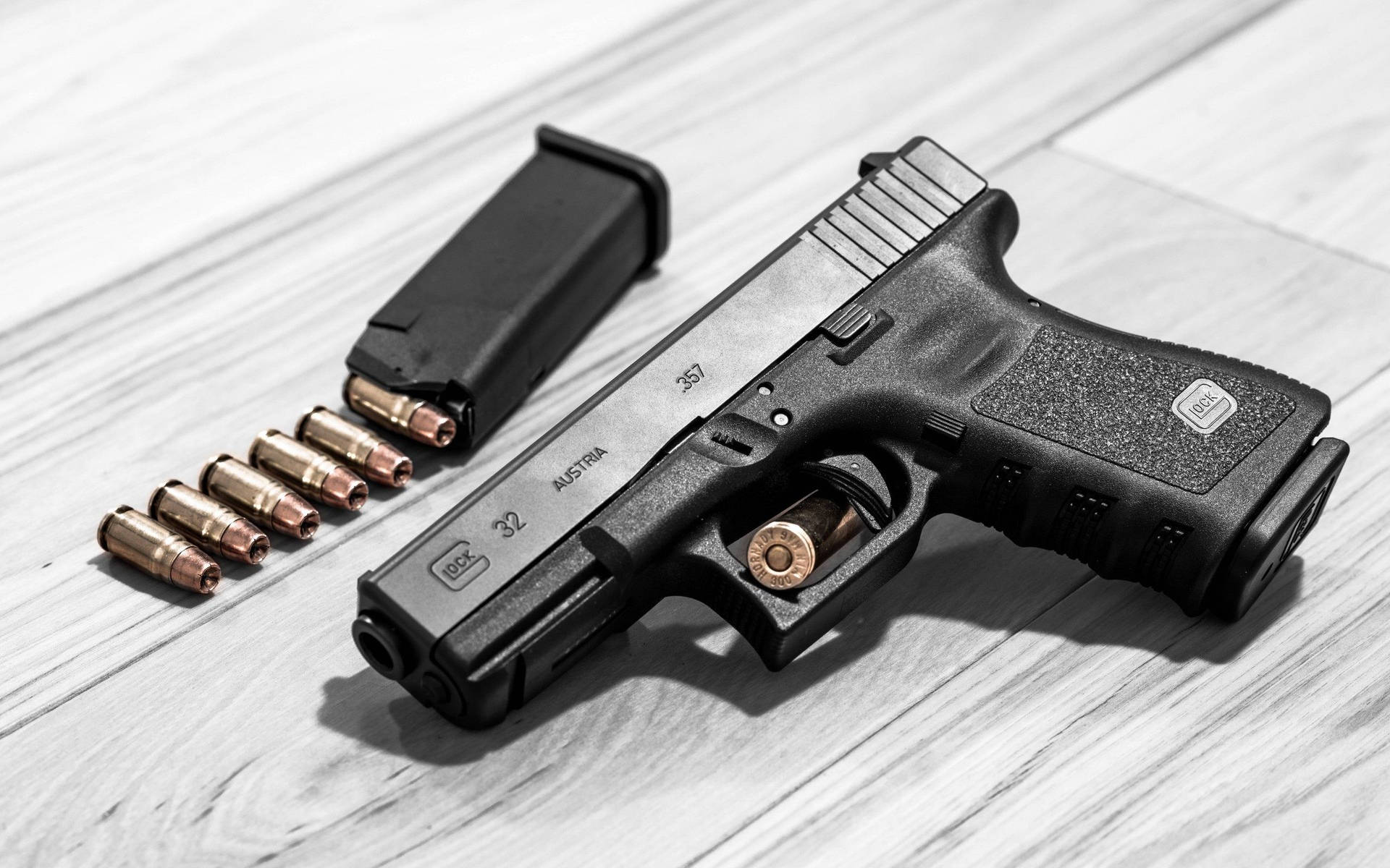 Glock 32 On White Oak Background