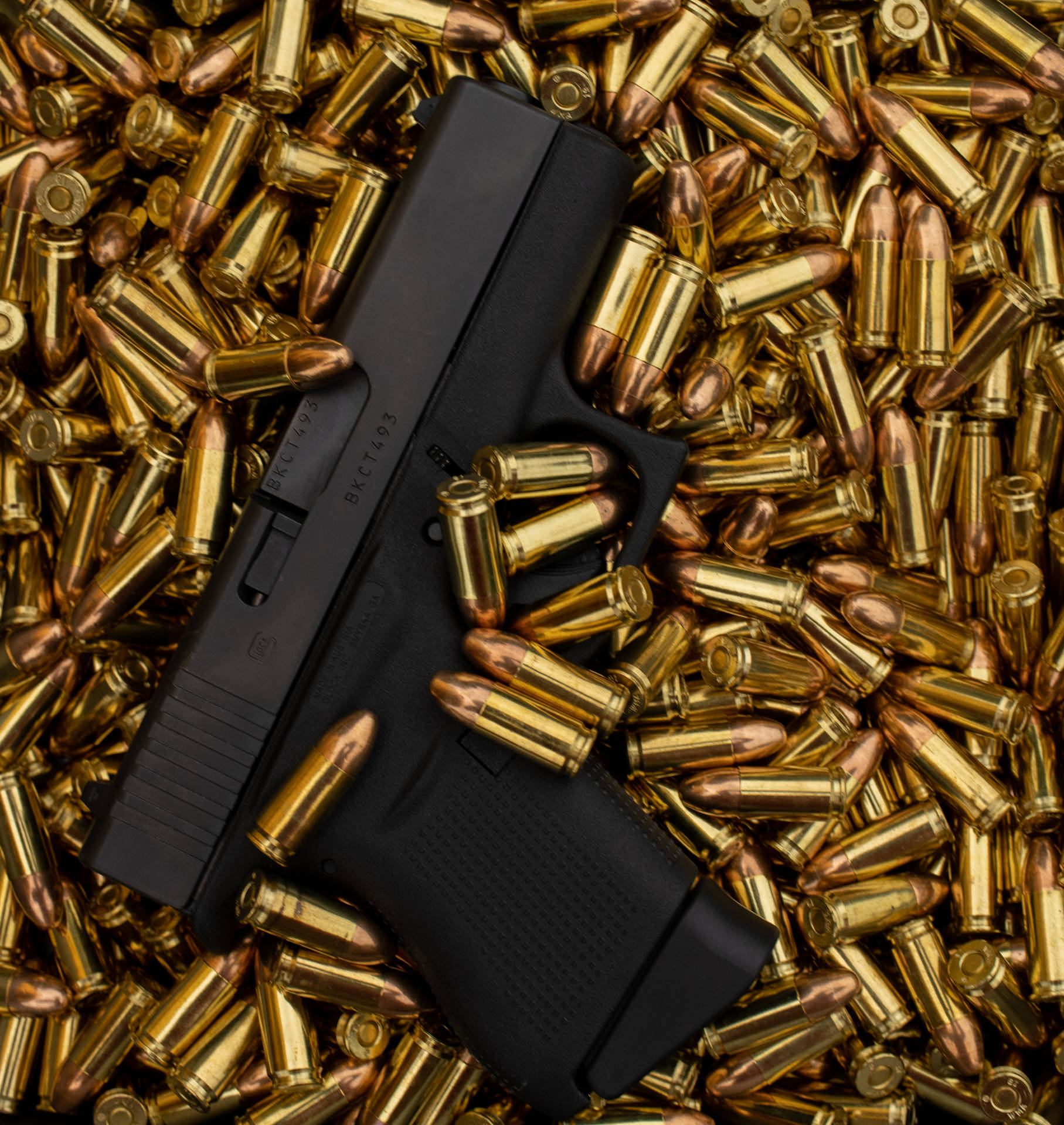 Glock On Top Of Bullets Background