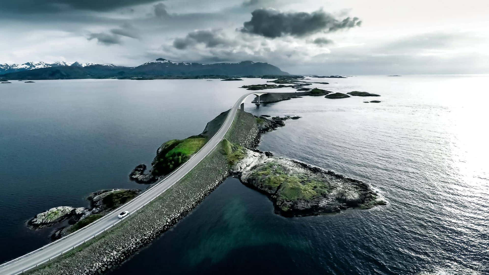 Gloomy Atlantic Ocean Road Storseisundet Bridge Background