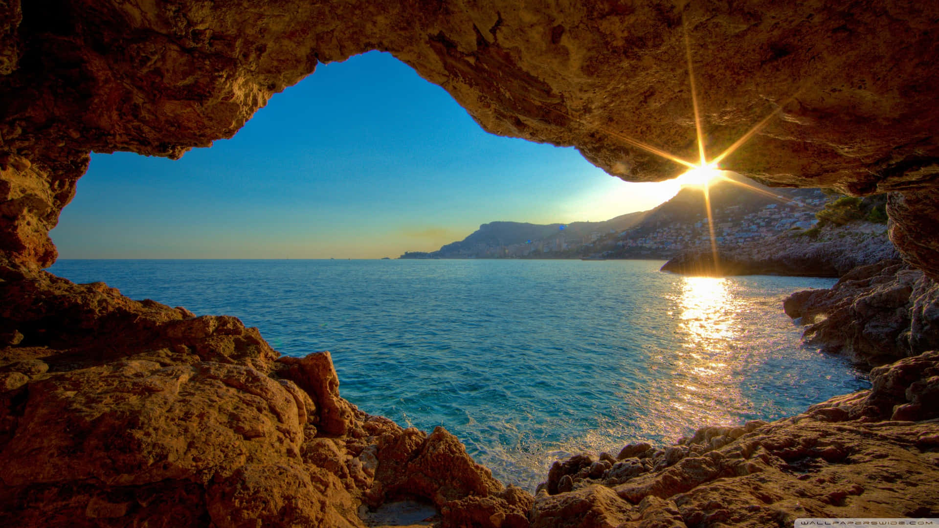 Glorious Natural Cave On An Island Background