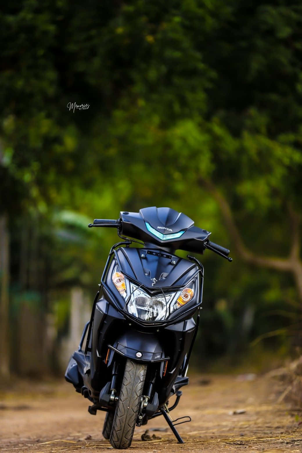 Glossy Black Honda Dio Bike Background
