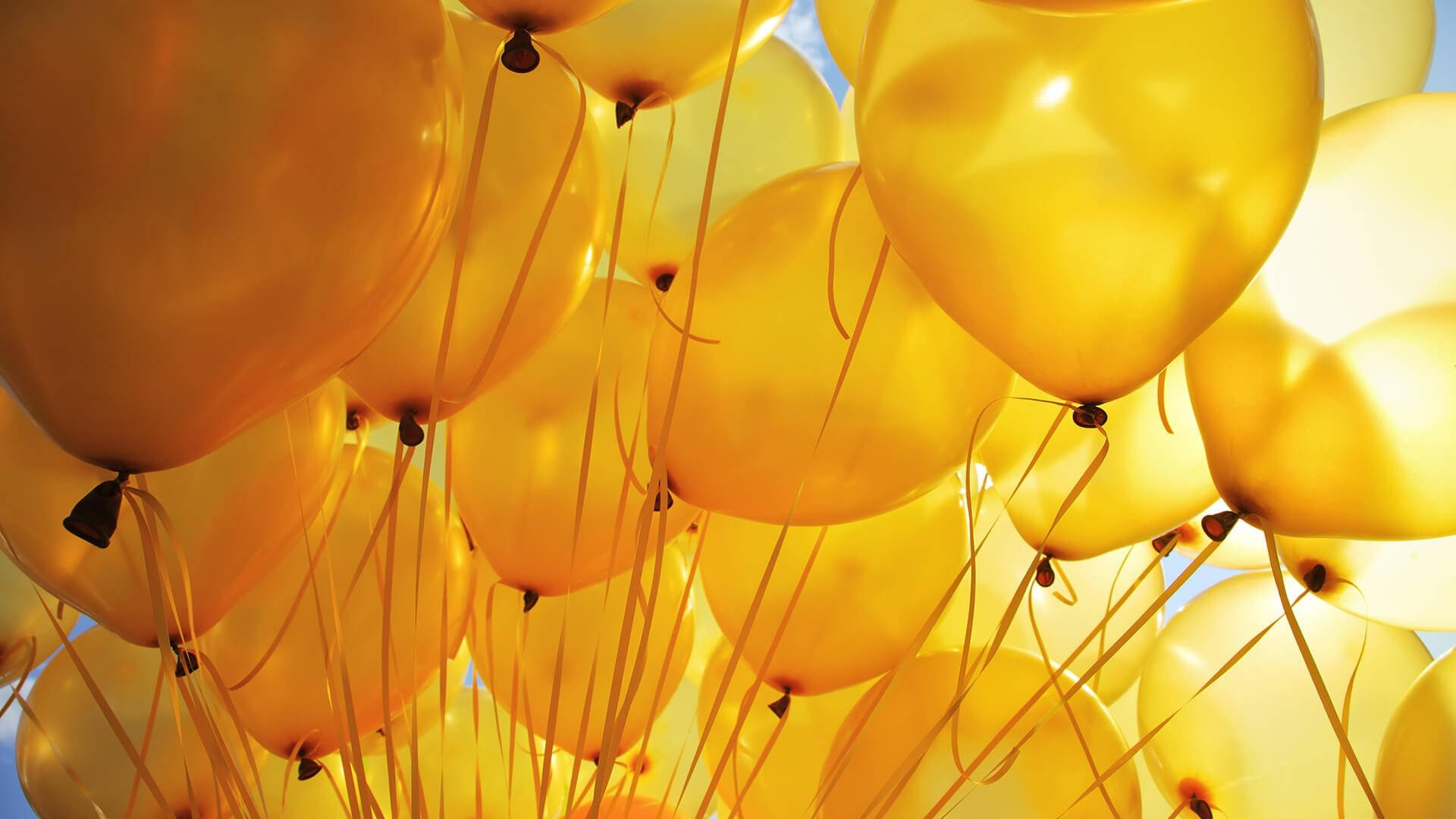 Glossy Pastel Yellow Balloons Background