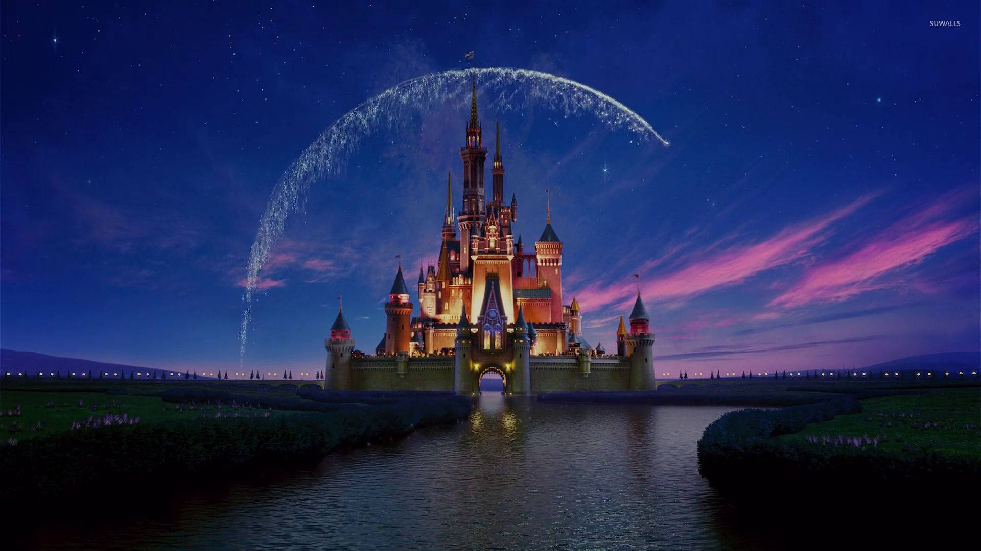 Glowing Disneyland Castle At Night Background