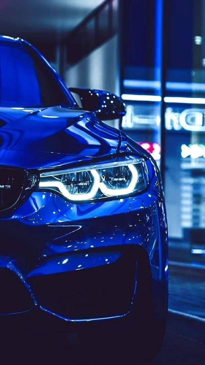 Glowing Headlight Of Blue Bmw