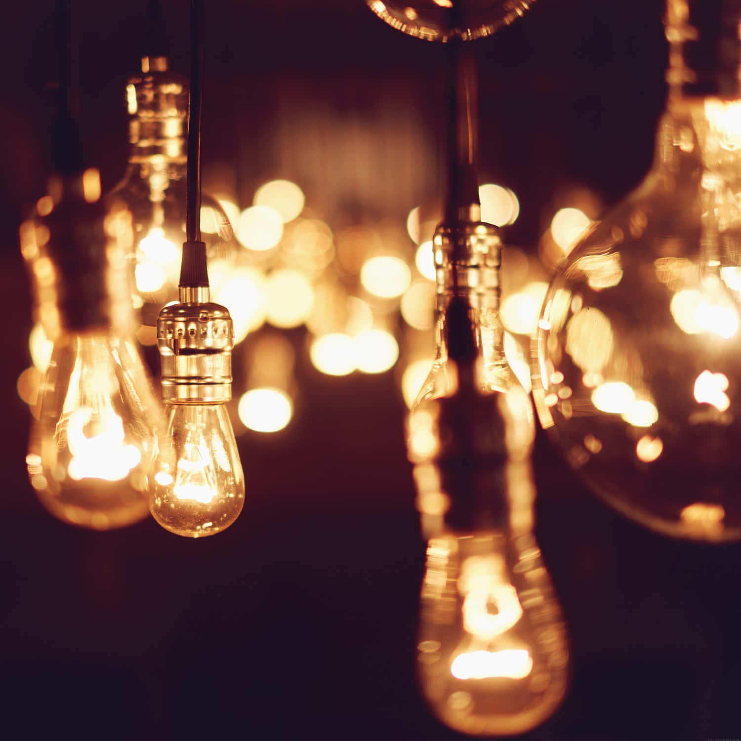 Glowing Incandescent Light Bulbs Background