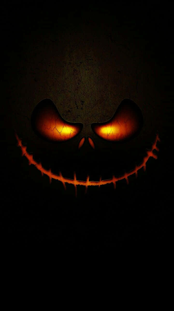 Glowing Jack O Lantern Face Dark Background.jpg Background