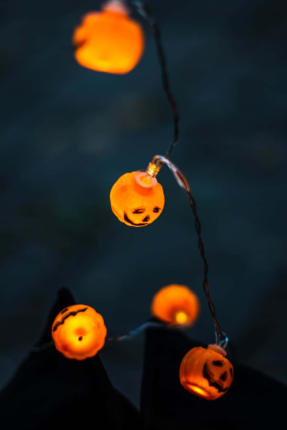 Glowing Pumpkin Lights Halloween Decor Background