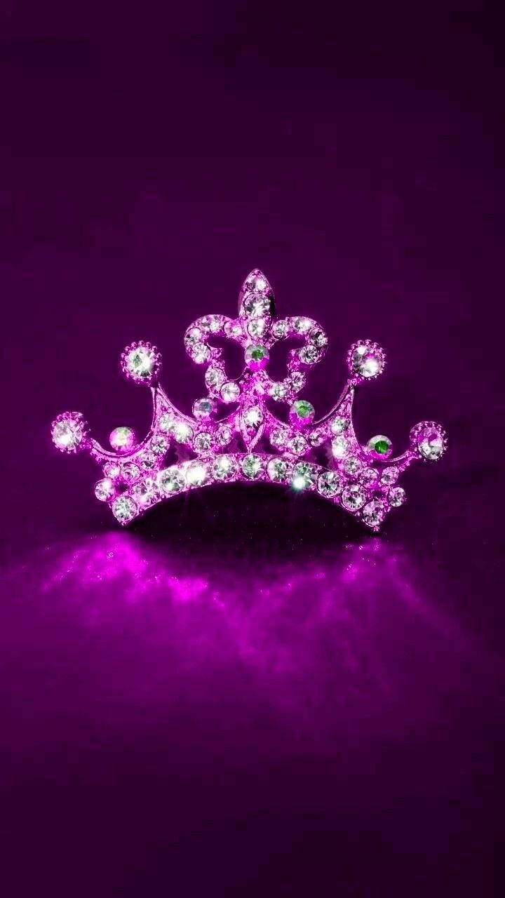 Glowing Purple King And Queen Crown Background