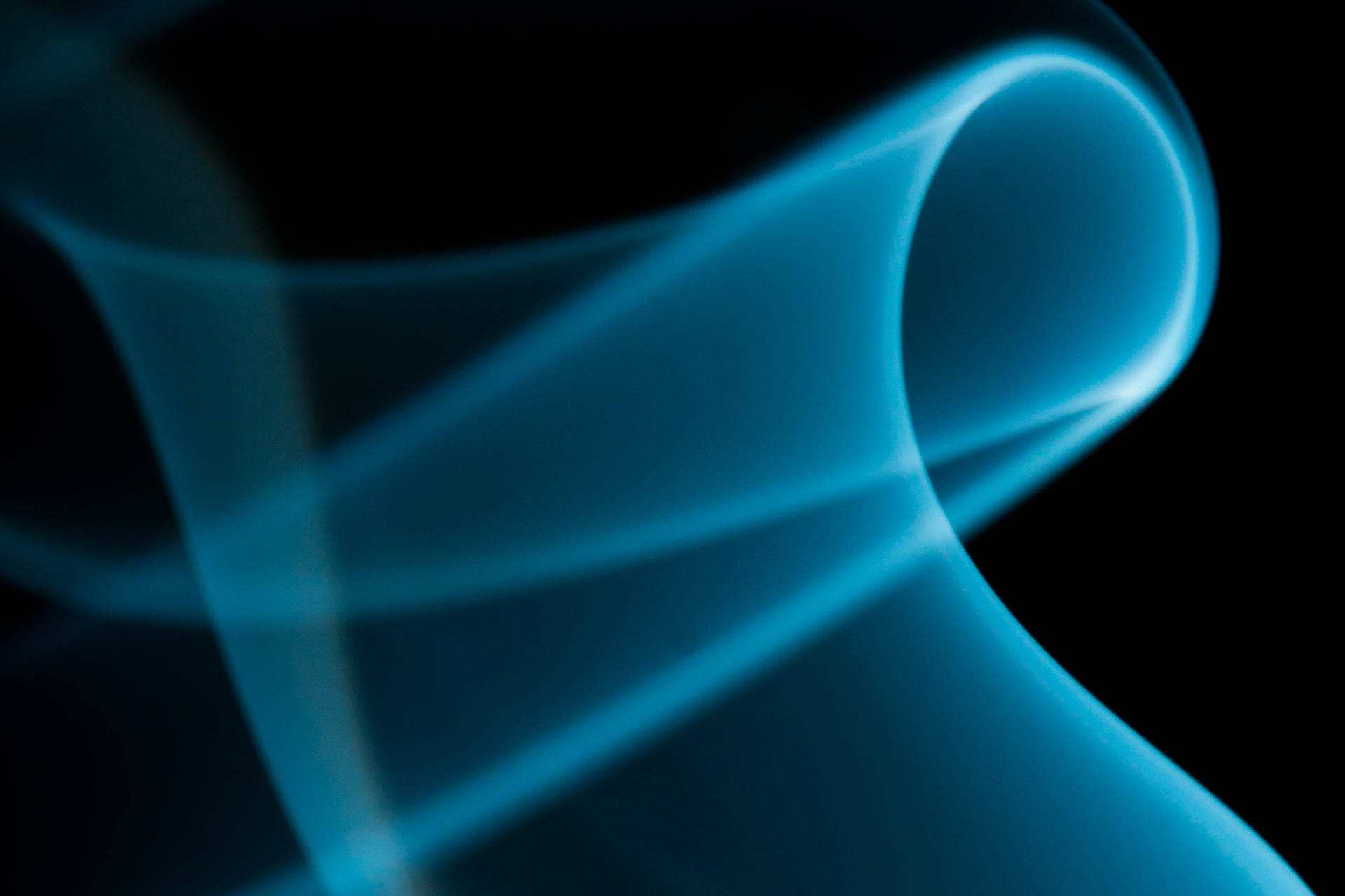 Glowing Wispy Blue Abstract Background