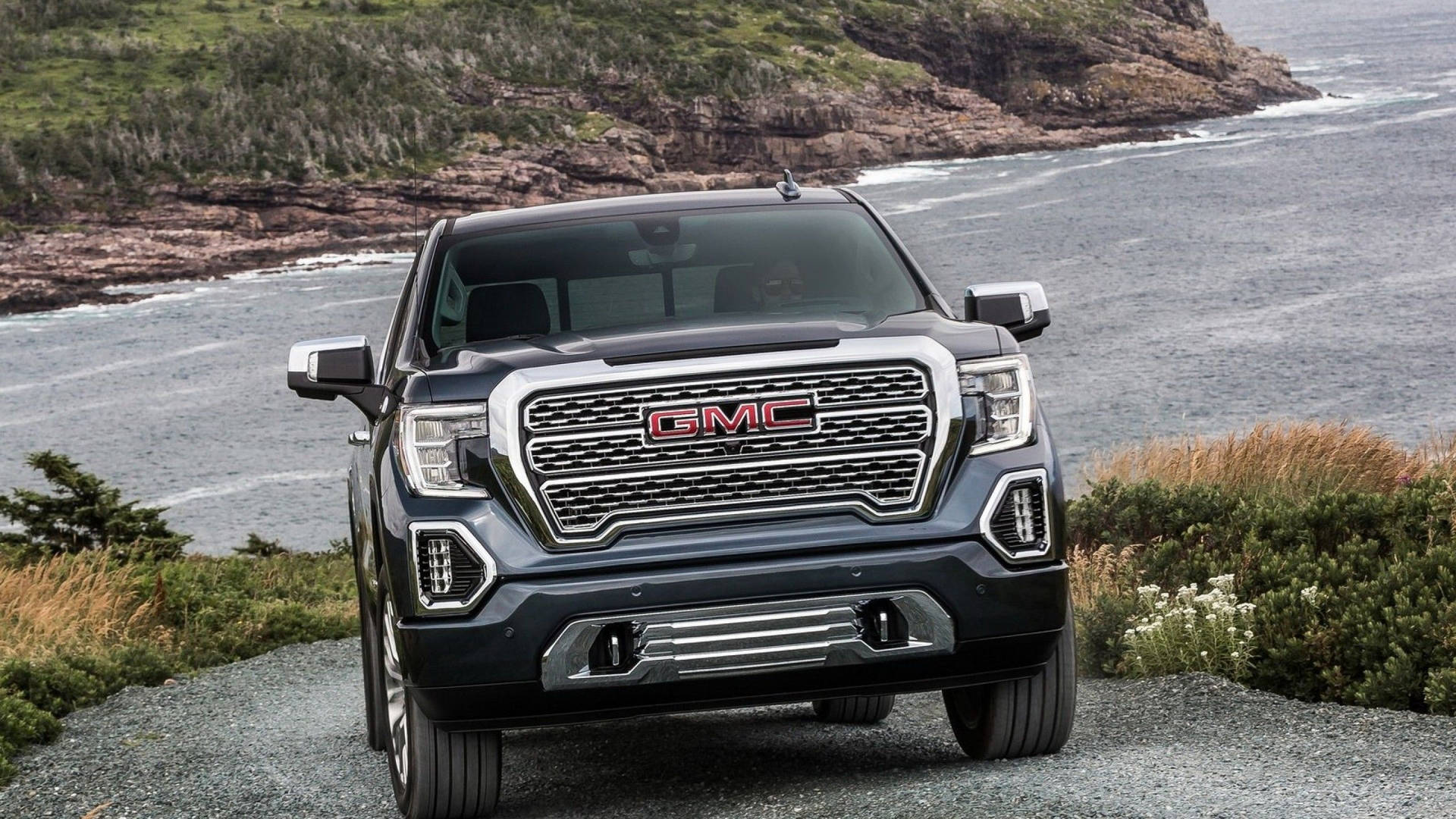 Gmc On The Uphill Road Background