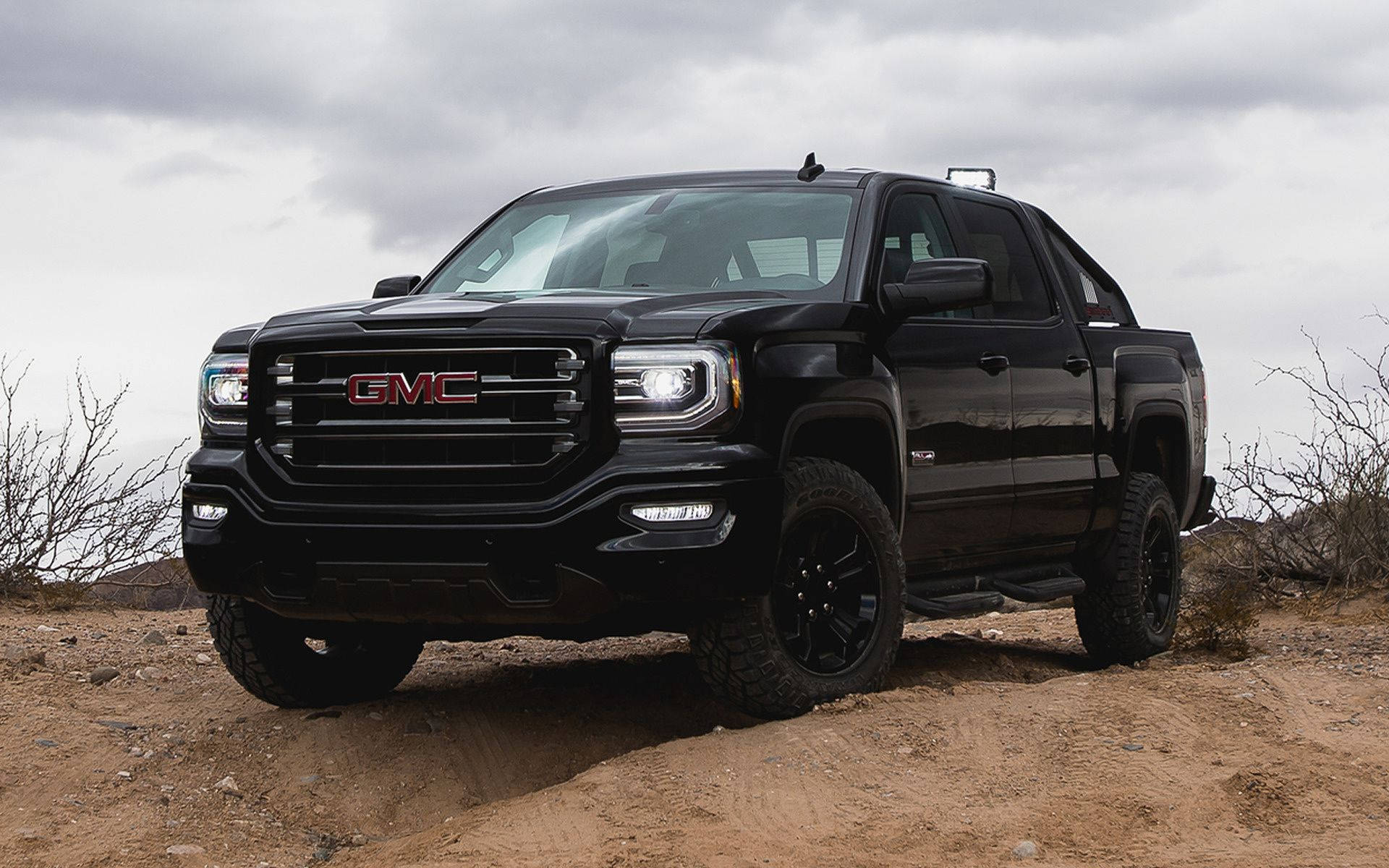 Gmc Sierra In All Black Color Background