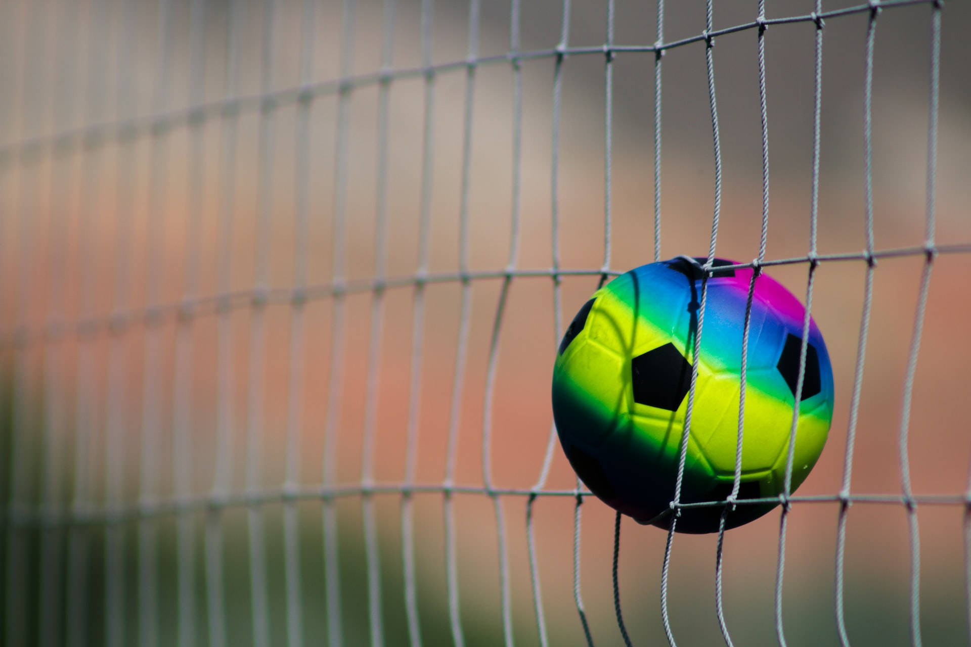 Goal And A Multicolored Football Hd Background
