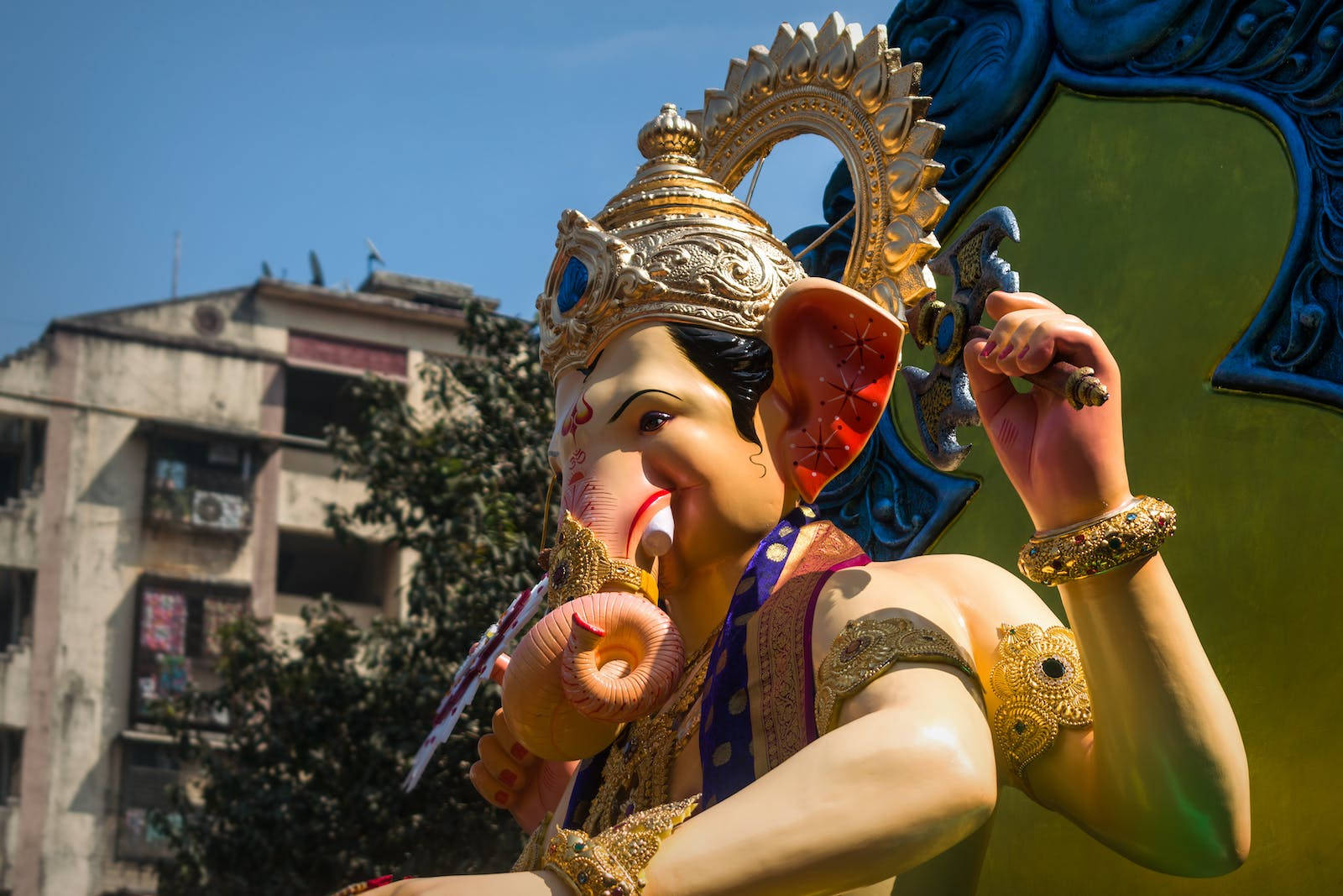 God Ganesh Colorful Statue Background