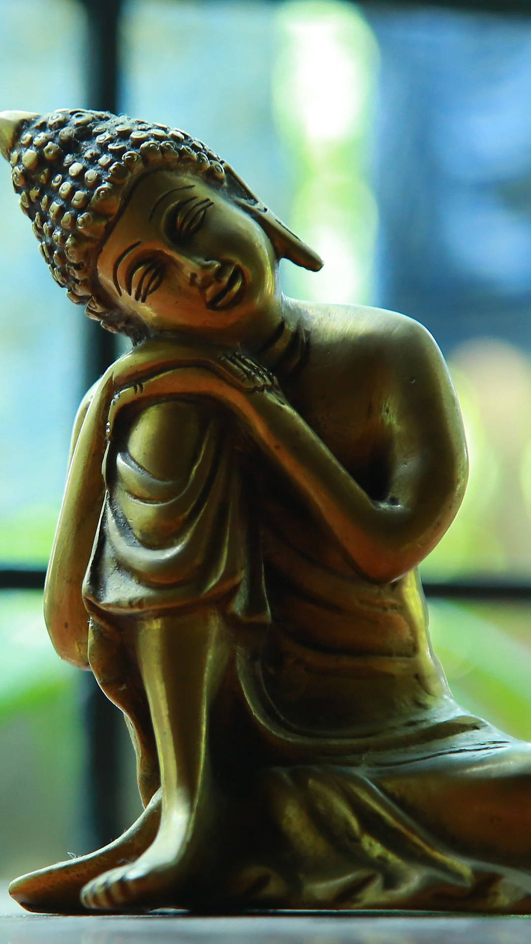 God Mobile Buddha Gold Figurine Background