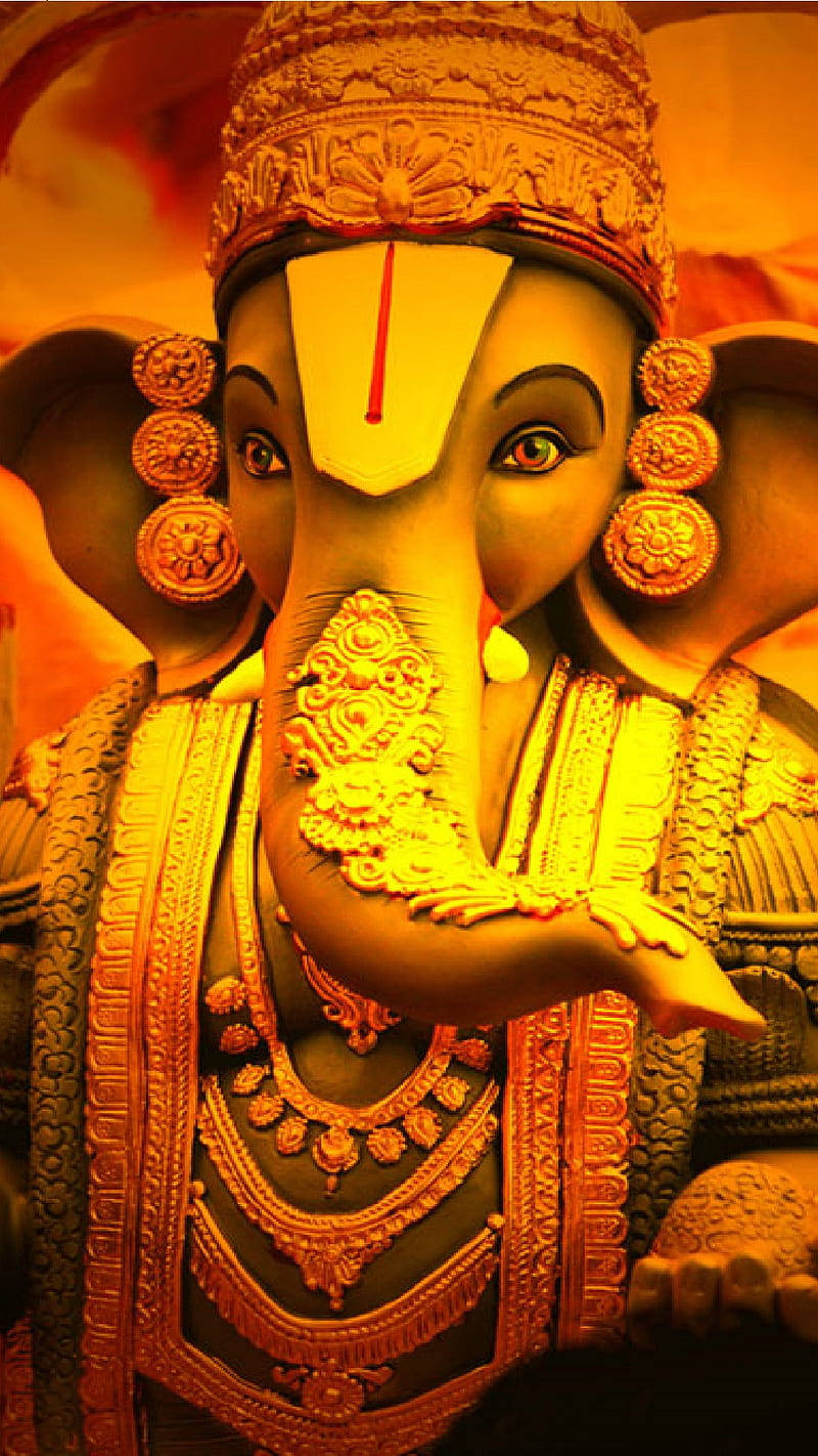 God Mobile Ganesha Figure Gold Theme Background