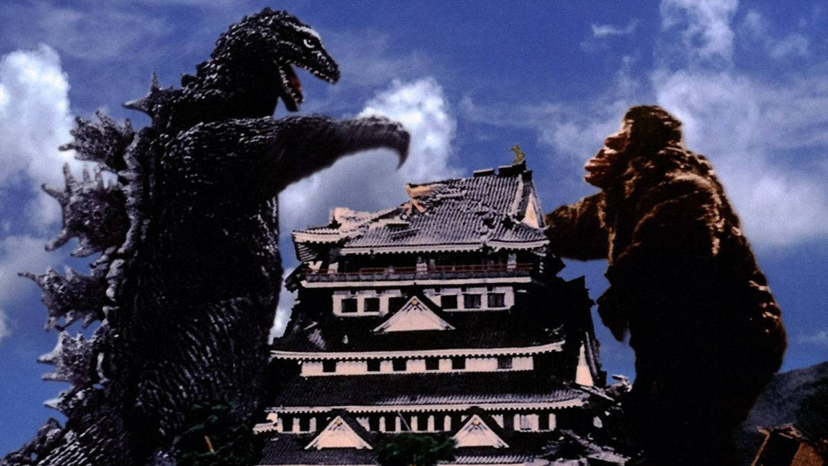 Godzilla And Kong Clash In The Streets Of Japan Background