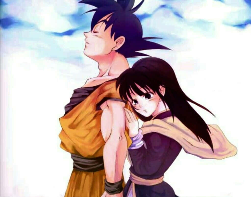 Goku And Chichi Sharing A Heartfelt Embrace Background