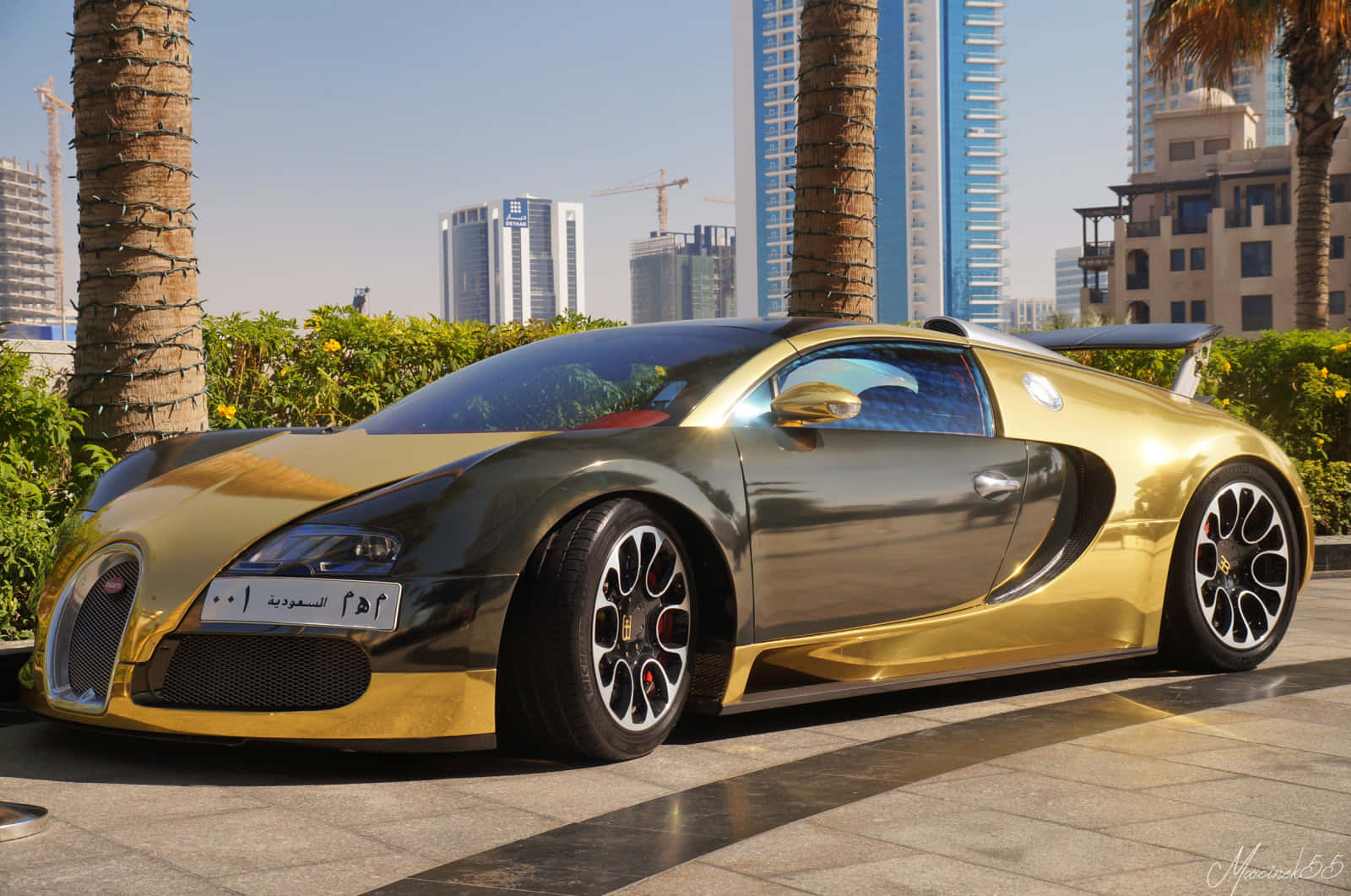 Gold Bugatti Veyron Car Parked Background