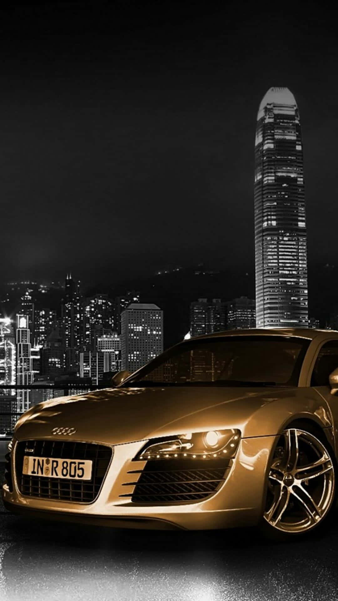 Gold Cars And Skyscraper Background