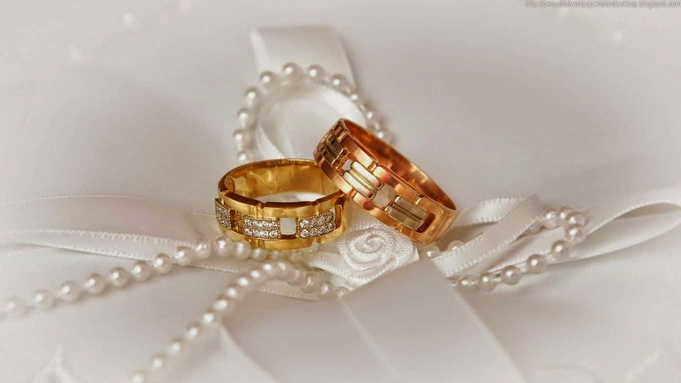 Gold Engagement Couple Rings Pearl Background