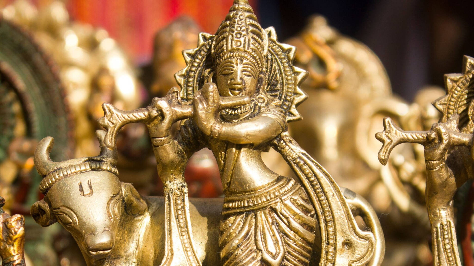 Gold Figurine Of Krishna Desktop Background