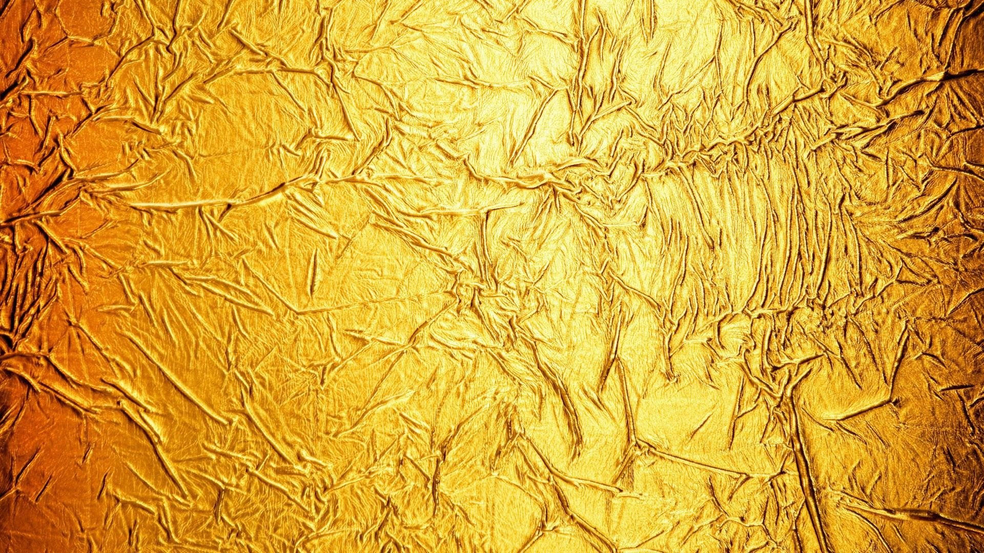 Gold Foil Wrinkled Paper Background