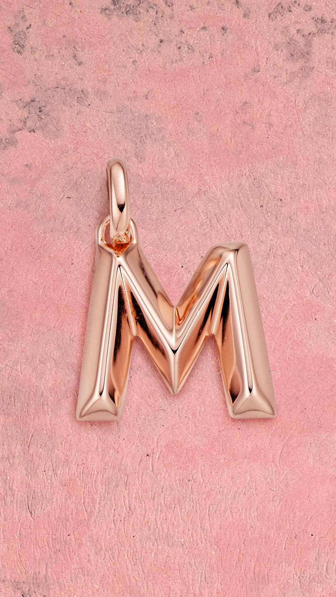 Gold-plated Letter M Background