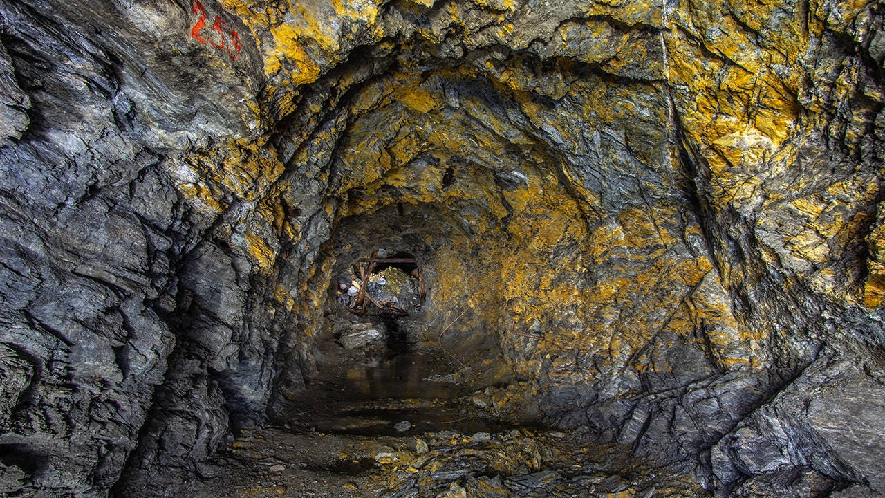 Gold Stains In The Goldmines' Adit Background