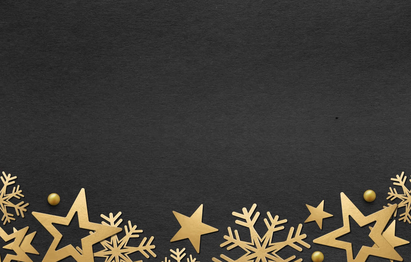 Gold Stars And Snowflakes On A Black Background Background