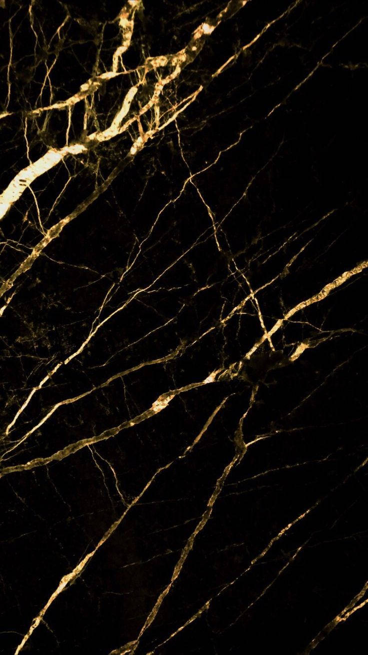 Gold Texture In Black Marble Background