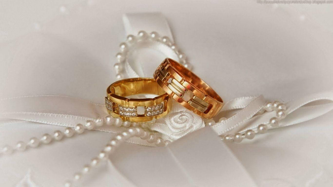 Gold Wedding Rings Tie The Knot Background