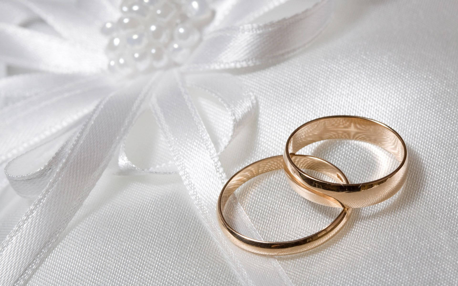 Gold Wedding Rings White Ribbon Background