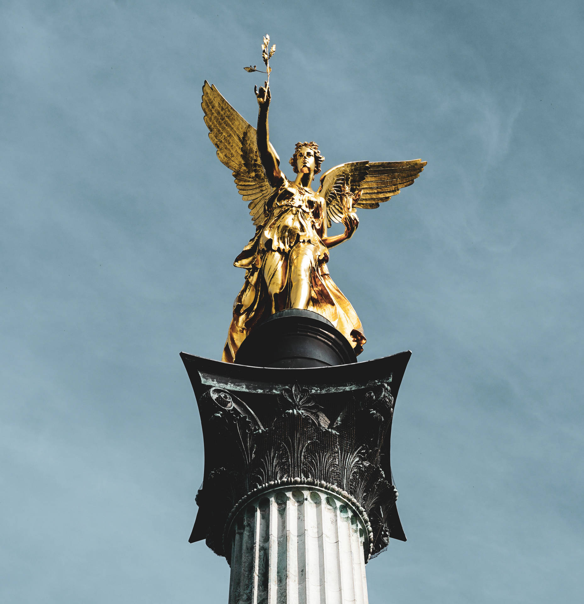 Golden Angel Sculpture Background
