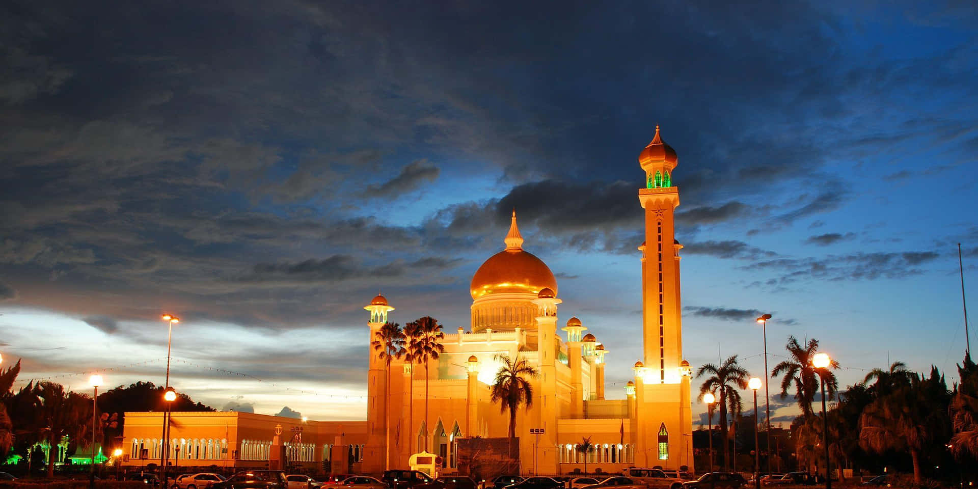 Golden Domed Mosqueat Dusk Background