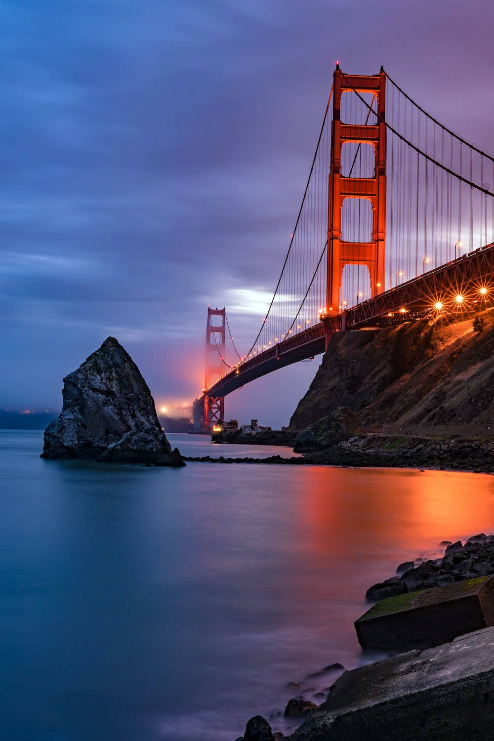 Golden Gate Bridge And Bay At Dusk