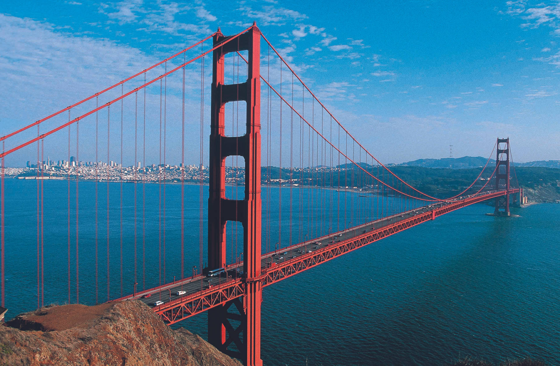 Golden Gate Bridge Suspended Over Blue Water Background