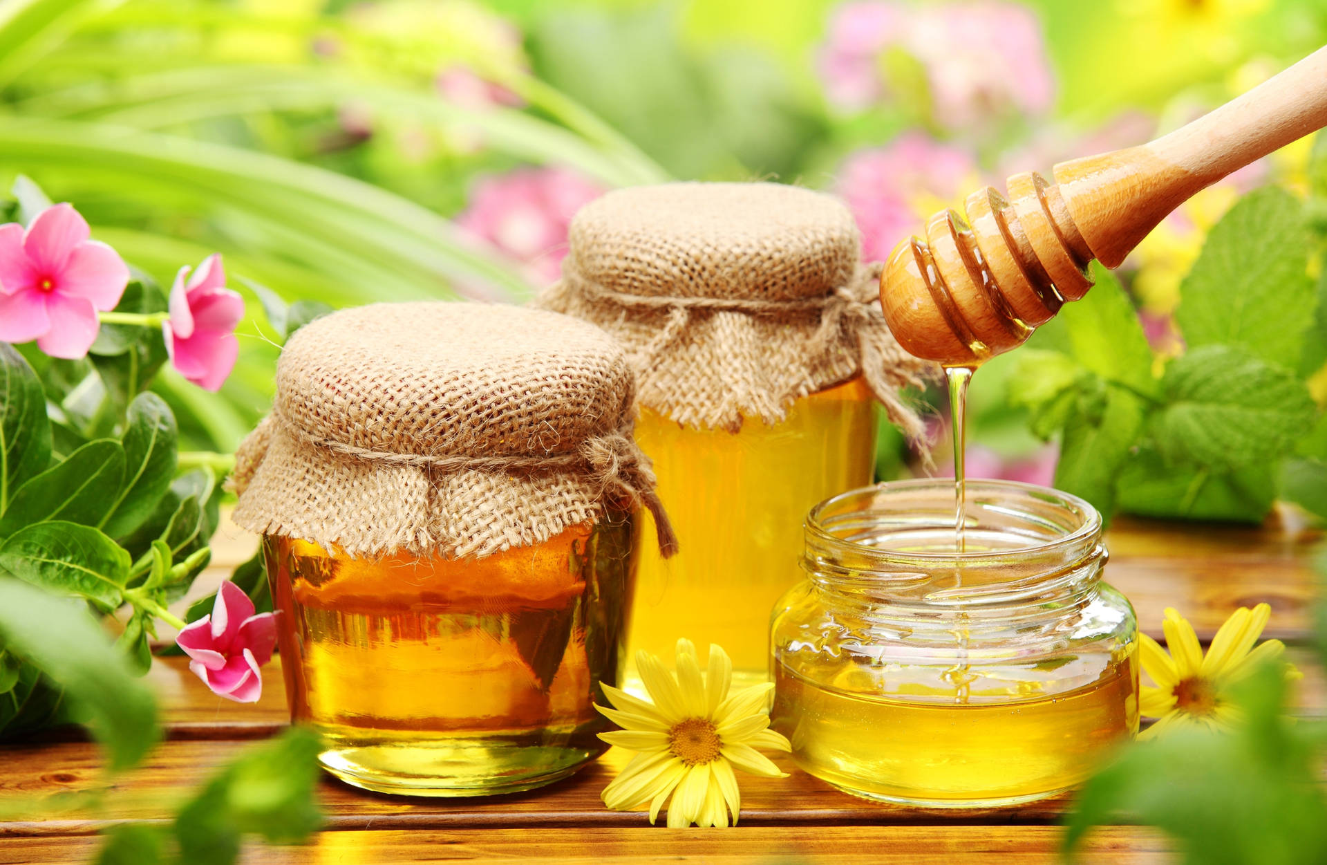 Golden Honey Delights On A Floral Table