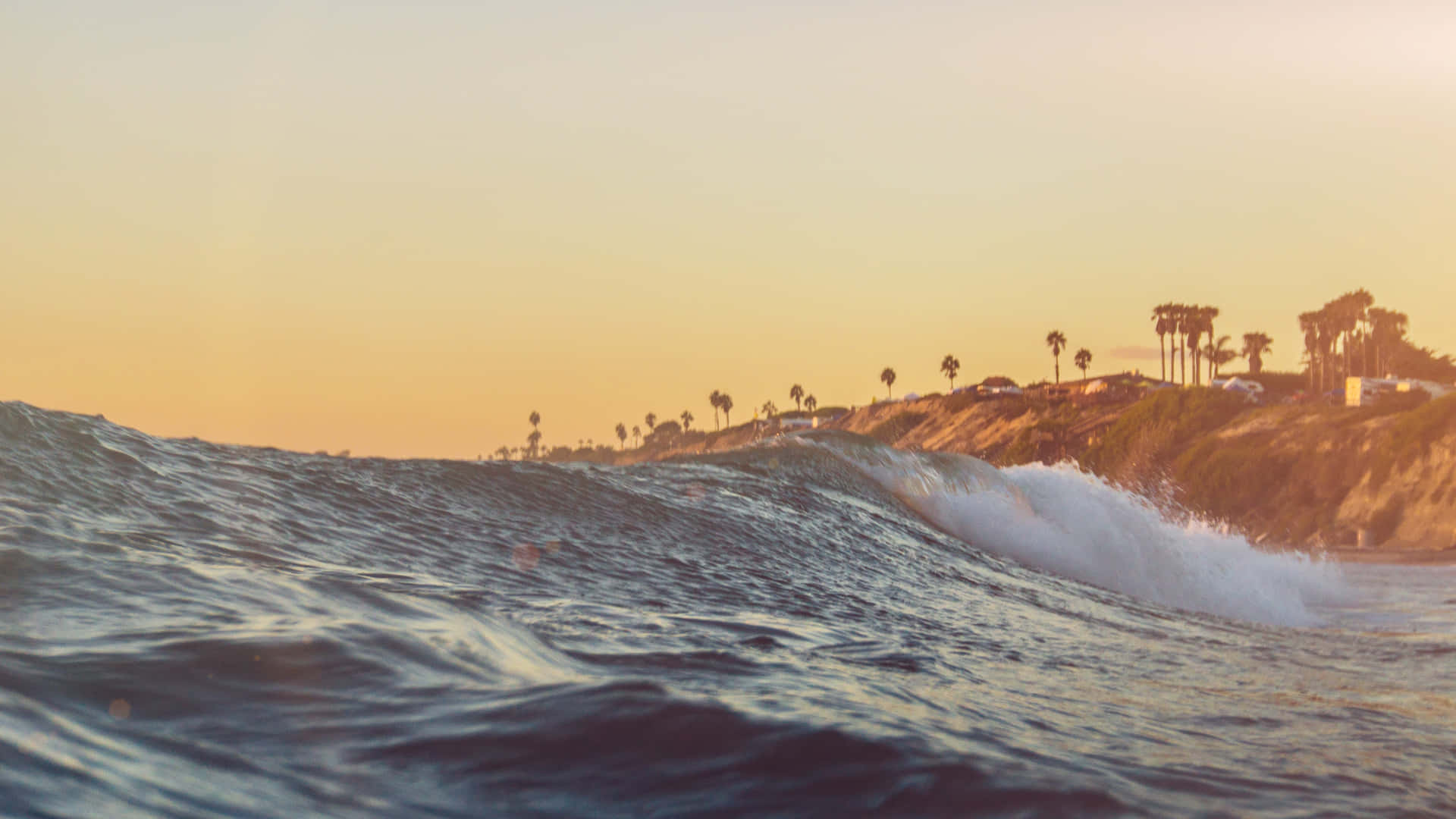 Golden Hour Beach Waves4 K Ultra Wide Background