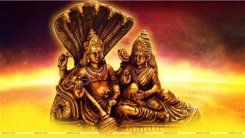 Golden Lord Vishnu Statue With Lakshmi Background