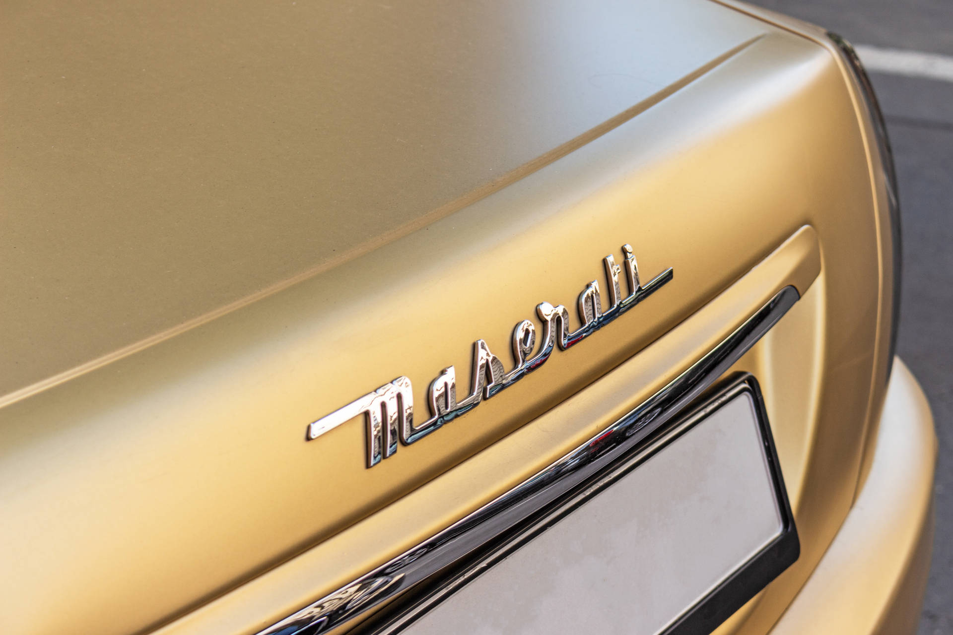 Golden Matte Maserati Background